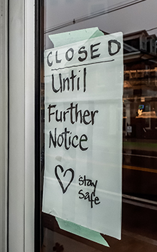 Shop sign: "Due to the Coronavirus we will be CLOSED until further notice. Thank you."